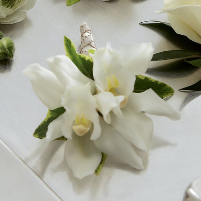 White Mini Cymbidium Boutonniere –  212 Floral, New York NY